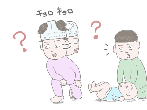 オムツ変え中に、何かを探している母のイラスト